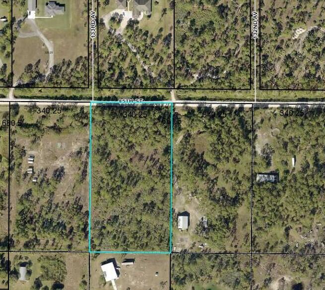 Where you build your next home - away from the traffic? Almost 5 acres with plenty of elbow room, yet only minutes from restaurants, shopping, I-95,and more! Plenty of space for a home, barn, animals, toys, etc. Lots of slash pines and palmettoes and just a short drive to the conveniences of town, the river and the beaches.
