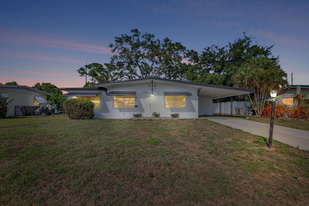 Photo of 119 E Arbor Avenue, Port Saint Lucie, FL 34952 (MLS # R10985662)