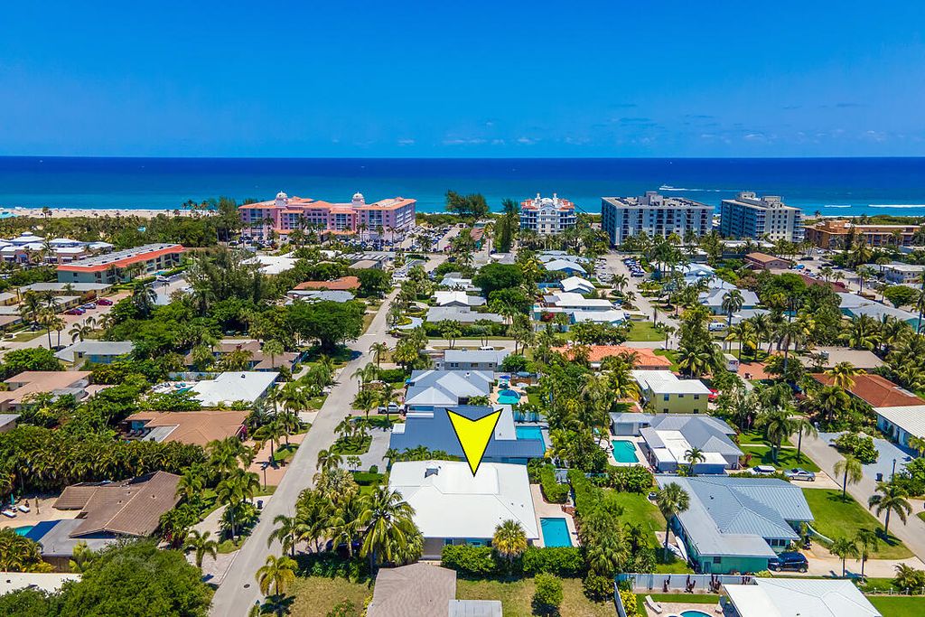 Photo of 218 Sandal Lane, Palm Beach Shores, FL 33404 (MLS # R10828621)