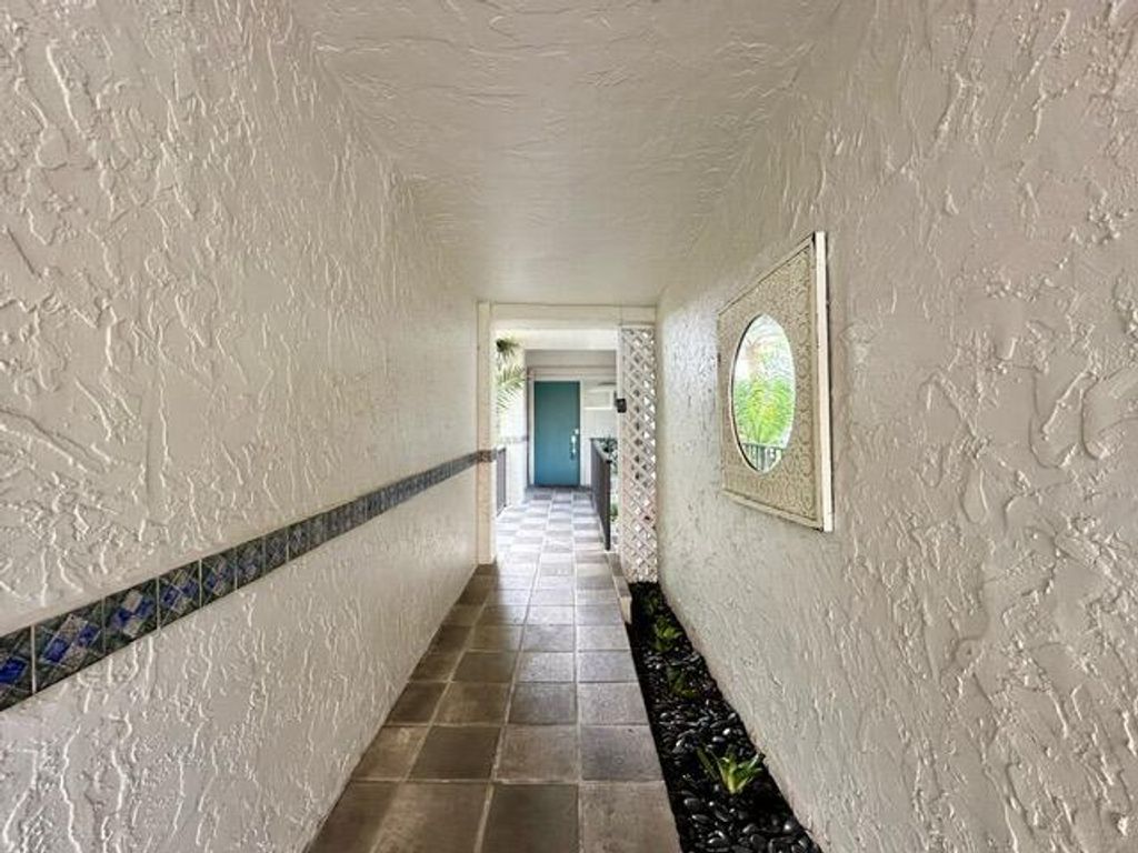 Photo of 3908 S Ocean Boulevard #T-1, Highland Beach, FL 33487 (MLS # R11081927)
