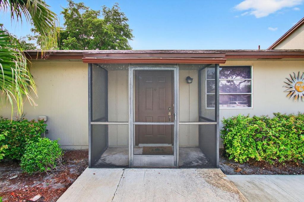 Photo of 11609 Orange Blossom Lane, Boca Raton, FL 33428 (MLS # R11111153)