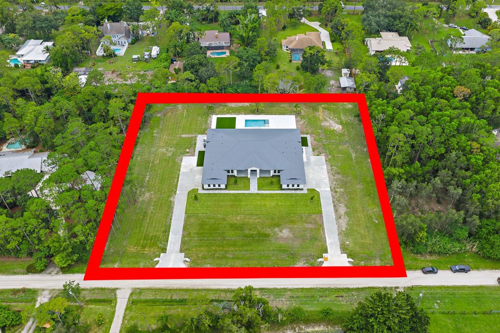 Photo of 12850 152nd Street N, Jupiter, FL 33478 (MLS # R11110106)