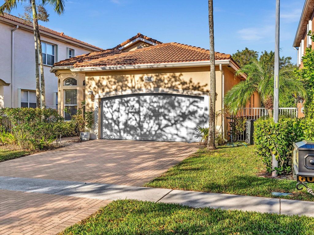 Photo of 607 Gazetta Way, West Palm Beach, FL 33413 (MLS # R11128555)