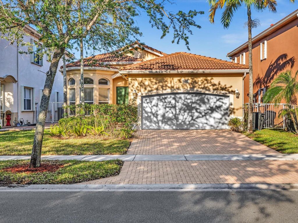 Photo of 607 Gazetta Way, West Palm Beach, FL 33413 (MLS # R11128555)