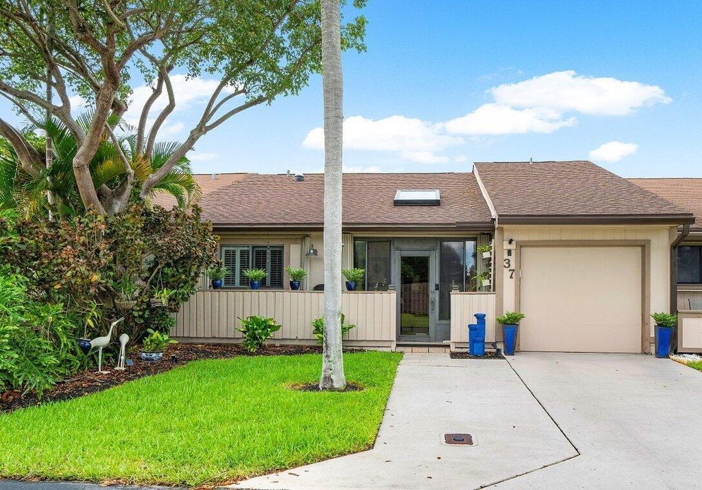 Photo of 37 Winchmore Lane, Boynton Beach, FL 33426 (MLS # R10923885)