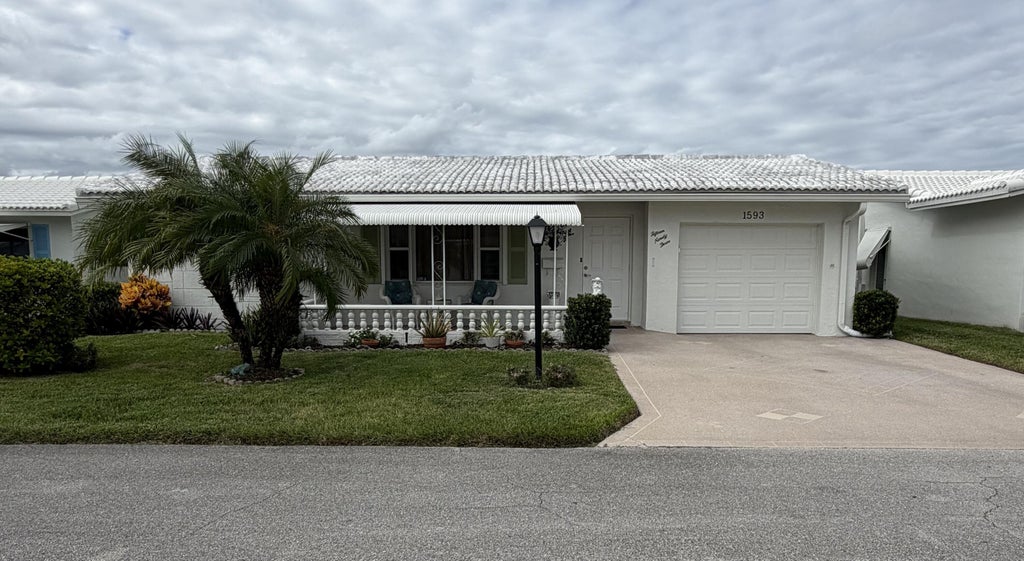 Photo of 1593 SW 14TH Avenue, Boynton Beach, FL 33426 (MLS # B26088558)