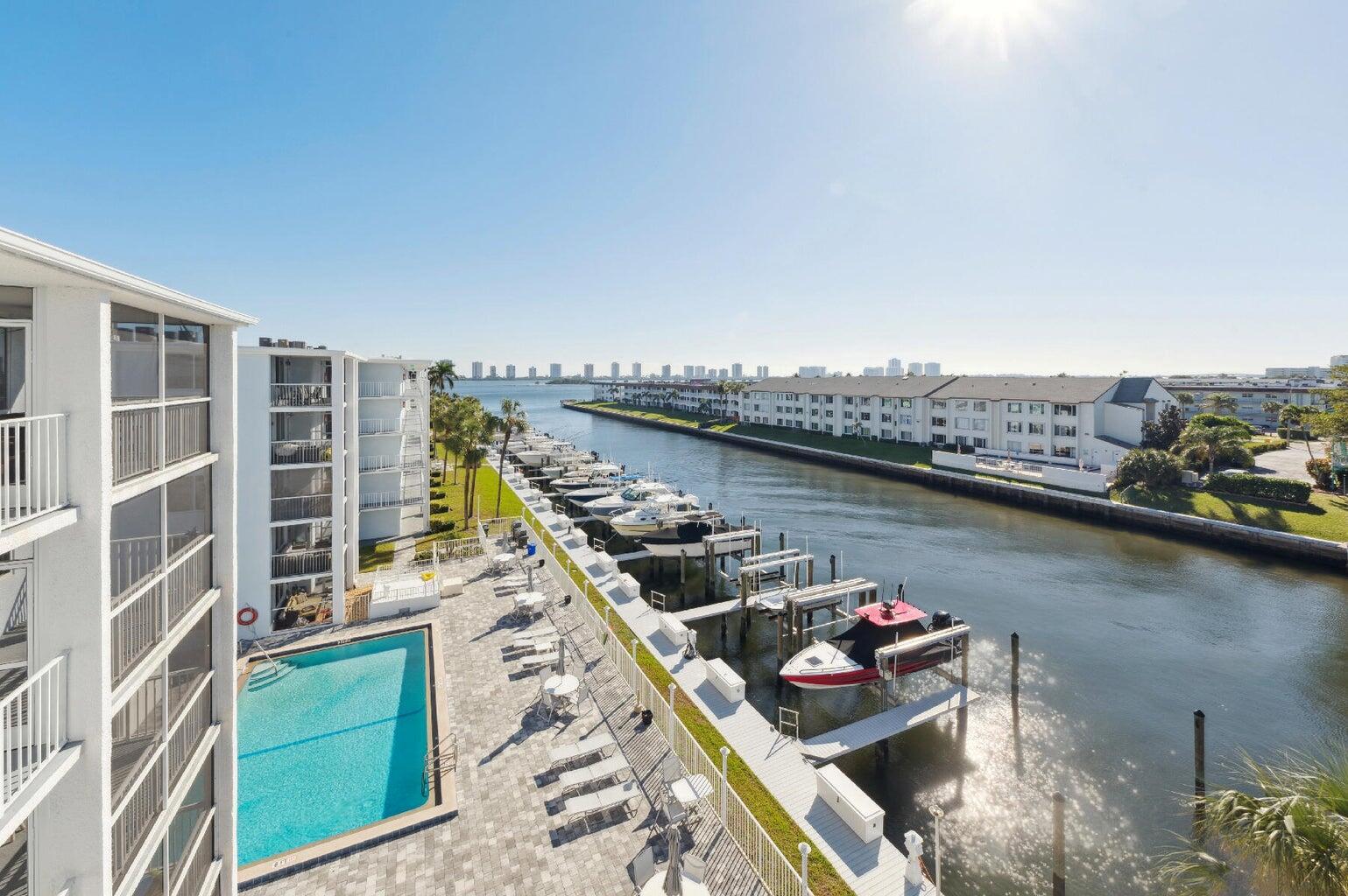 Waterfront living in a completely renovated furnished condo! This unit has been meticulously renovated to the highest standards. This home offers a fully furnished setup with those seeking a turn-key living experience. The captivating water views and tranquil community is in the heart of North Palm Beach. Ideally situated just minutes away from the Atlantic Ocean, two inlets, fabulous fishing, world-class golf, upscale shopping and the airport just 15 minutes away. The property features a 39 slip marina with hoists. Slips may be rented when available.
