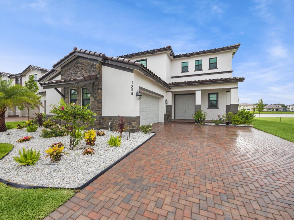 Photo of 1325 Whitcombe Drive, Royal Palm Beach, FL 33411 (MLS # R11167836)