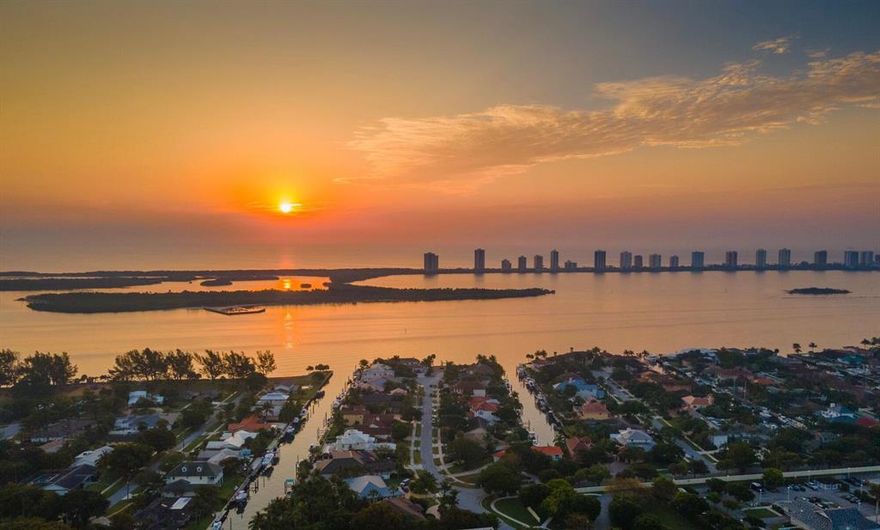 Incredible South Florida Waterfront British West Indies Style Estate currently under construction 280' of Magnificent Waterfront/100' of deepwater canal including 2-24k lb boat lifts. Spectacular sunrises and sunsets on over 1/2 acre in the heart of the Palm Beaches. A Real Yachtsman's Paradise just minutes away from the best sport fishing, scuba diving and waterfront restaurants and tiki bars.No expense spared, with 7422 sq ft under air, Guest house. Top of the line appliances and finishes throughout. Featuring a 1st floor master, open concept kitchen and living areas, flowing seamlessly to Expansive 1200+/- SqFt air conditioned outside living area with a summer kitchen and cabana bath. Infinity saltwater pool with chiller/heater, gas fire pit, fire pots and tiki's. Fathom screens