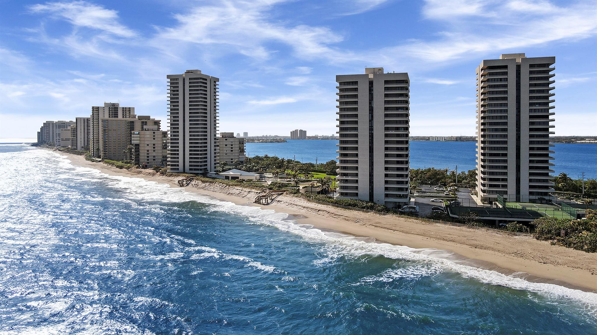 Available for Season 2025! Ocean views! SUNRISE AND SUNSET VIEWS * WRAP AROUND BALCONY * DIRECT OCEAN AND INTERCOSTAL VIEWS FROM EVERY ROOM. ALL TILE FLOORS, NEW OPEN KITCHEN, GRANITE COUNTERS, STAINLESS APPLIANCES, FULLY FURNISHED AND READY TO ENJOY! 2 MASTER BEDROOMS, 2 FULL BATHS. 4 UNITS PER FLOOR. WATER GLADES COMMUNITY FEATURES 2 HEATED POOLS,4 TENNIS COURTS,NEW CLUBHOUSE, PUTTING GREEN, BBQ AREA,24 HOUR MANNED SECURITY GATE. MANGR ON SITE. ASSIGNED PARKING.