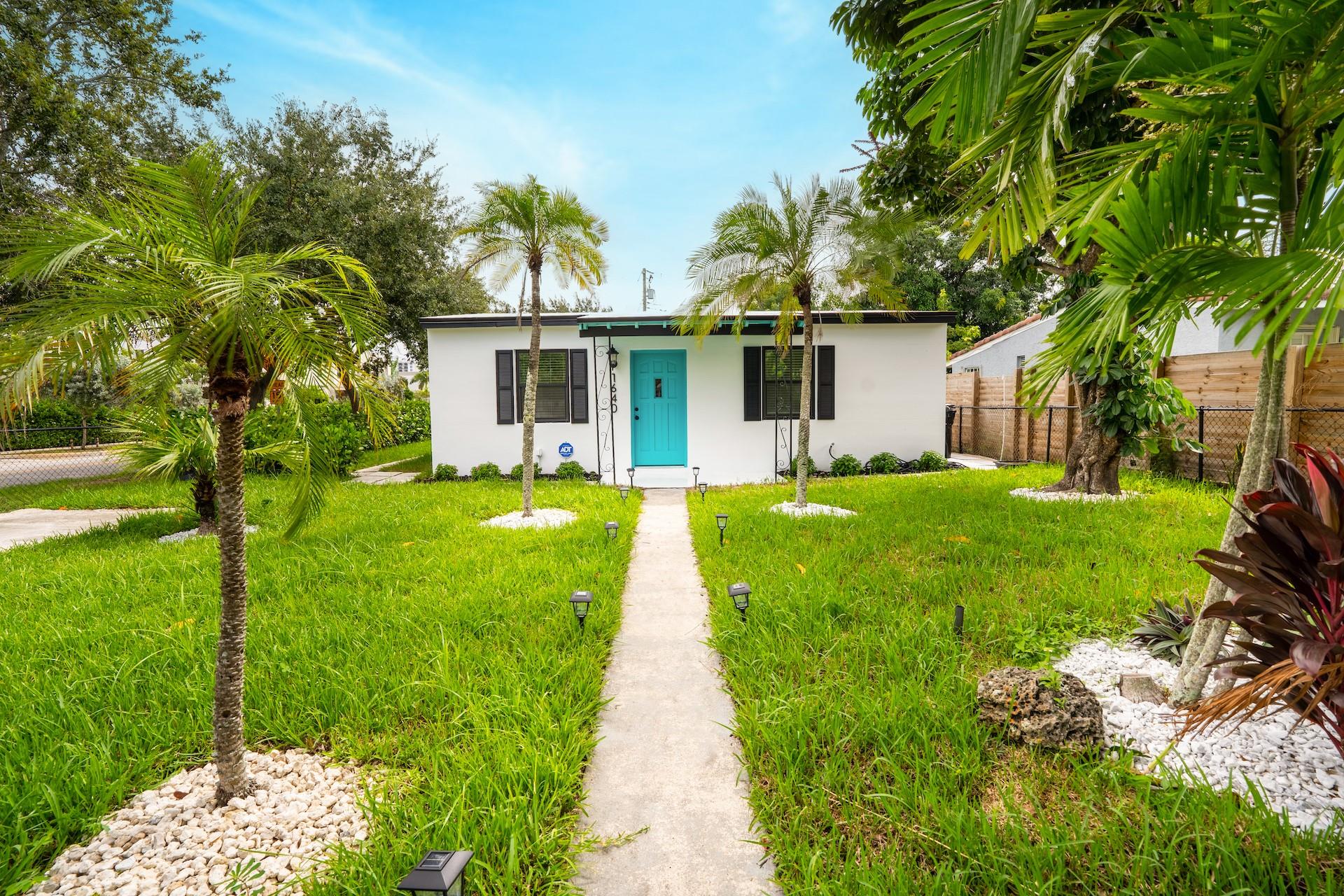 Beautiful fully remodeled 2/1 home. Everything has been completely updated! Beautiful designer kitchen with all new appliances, new bathroom, beautiful wood floors throughout, freshly painted inside and outside, new landscaping, and washer/dryer inside home. Bonus room off Master bedroom makes a perfect office. Great location just minutes to beautiful Fort Lauderdale beach, downtown, Las Olas, I-95, Galleria Mall and lots of Trendy Restaurants and Shopping. Wilton Drive is less than 1.5 miles away. Huge corner lot with fully fenced back yard. Home comes with Alarm System. Rent includes: Alarm service, landscaping and outside extermination. Don't miss this charming home!