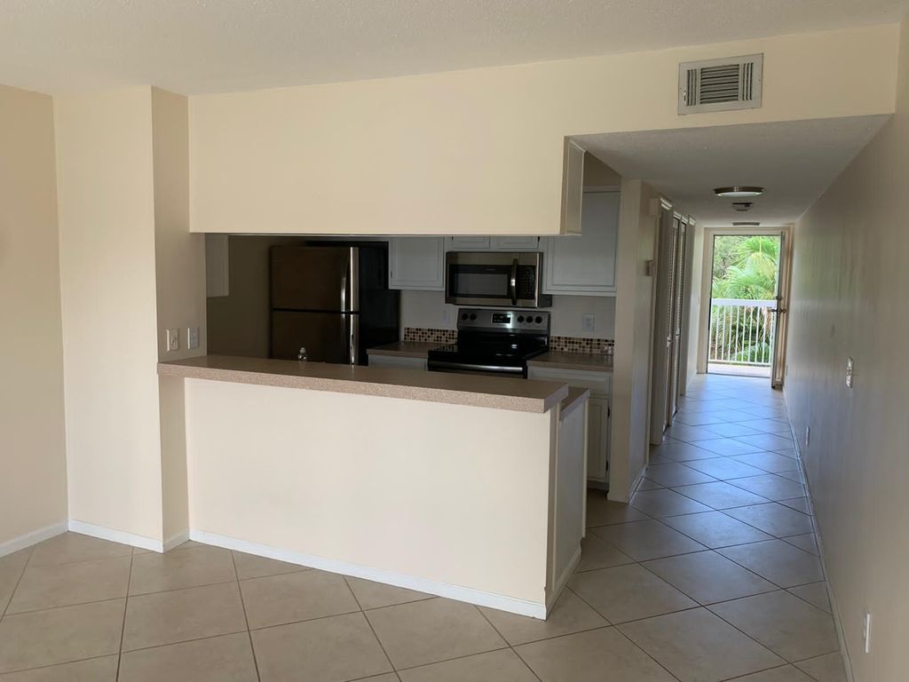 Photo of 293 Cypress Point Drive #293, Palm Beach Gardens, FL 33418 (MLS # R11017455)