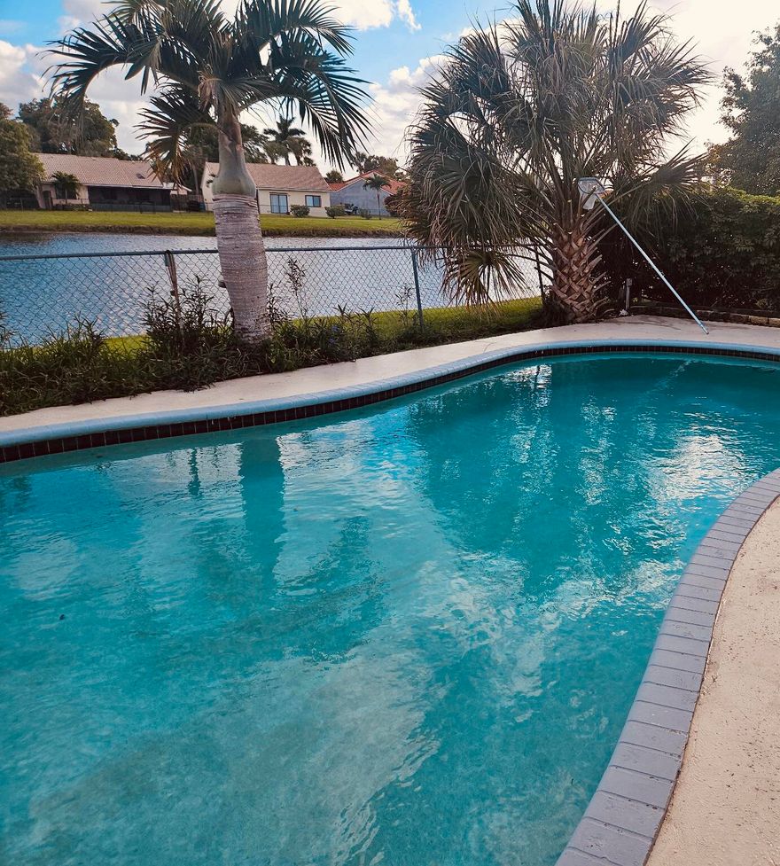 Beautifully updated lakefront pool home in desirable West Boynton Beach with wide water views and a private screened patio for year-round outdoor living. Features 3 true bedrooms plus a flexible 4th bedroom/den with a window and doors (no built-in closet), ideal for office or guest space. High ceilings. Partial impact windows and sliders. Bright open layout captures natural light and lake views throughout. Located near Canyon Town Center, Cobblestone Commons, and Boynton Beach Marketplace featuring Whole Foods, plus Sprouts and Publix nearby. Zoned for West Boynton Middle School. Rare opportunity to own a lakefront pool home in a prime location—homes like this move quickly. Low HOA! Prime West Boynton Beach location offering convenience, accessibility, and strong lifestyle appeal. Ideally situated near Florida's Turnpike, Jog Road, and Boynton Beach Blvd for easy commuting throughout Palm Beach County.  Just minutes from Bethesda Hospital West and surrounding medical services.  Close to top west Boynton retail and dining including Canyon Town Center, Cobblestone Commons, Fountains Shopping Center, and Boynton Beach Marketplace with Whole Foods. Additional grocery options include Sprouts Farmers Market and Publix. Nearby fitness studios, restaurants, cafés, and everyday conveniences support a highly livable lifestyle.  Easy access east to Atlantic beaches, Delray Beach, and Boca Raton, and west to Wellington. Close to outdoor recreation including Green Cay Nature Center and Wetlands, Wakodahatchee Wetlands, and Arthur R. Marshall Loxahatchee National Wildlife Refuge. Nearby golf courses and parks further enhance the appeal.  Highly sought-after area for buyers searching lakefront pool homes in West Boynton Beach near shopping, Whole Foods, major highways, and beaches, offering long-term value and strong demand.