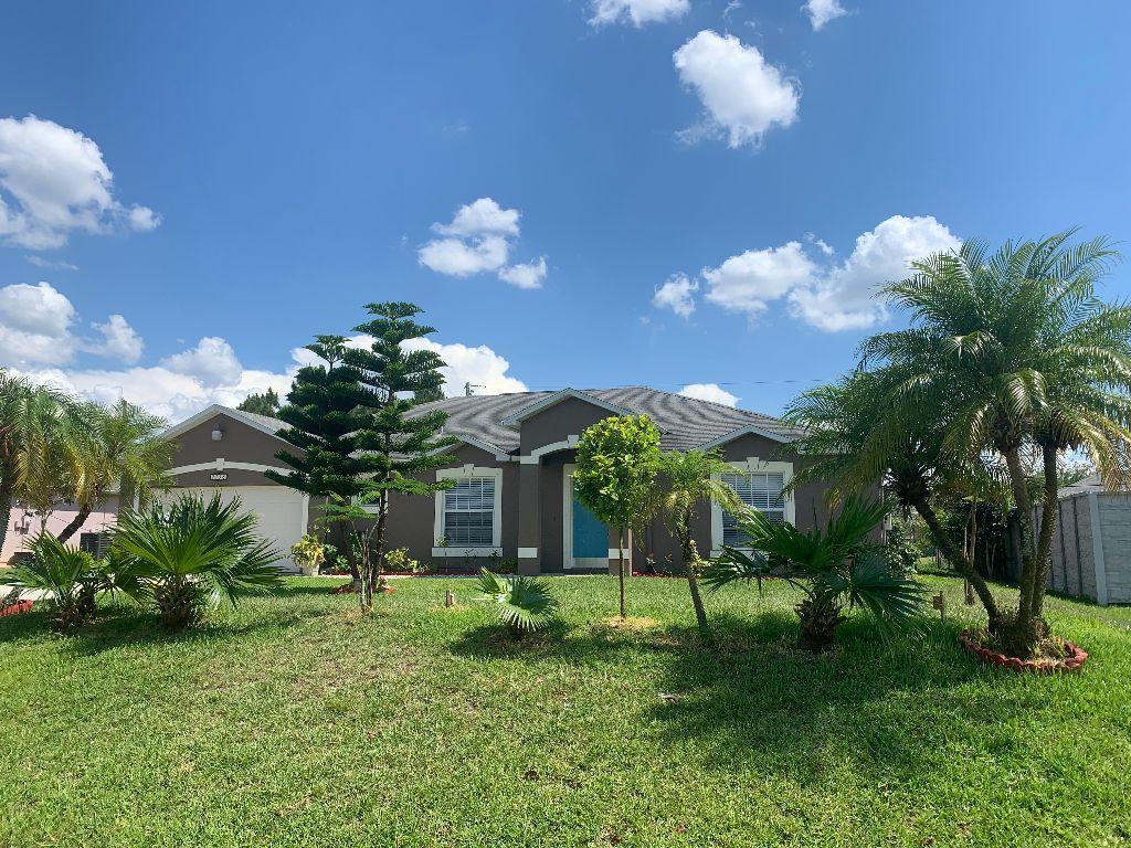 Photo of 2138 SW Devon Avenue, Port Saint Lucie, FL 34953 (MLS # R10714313)