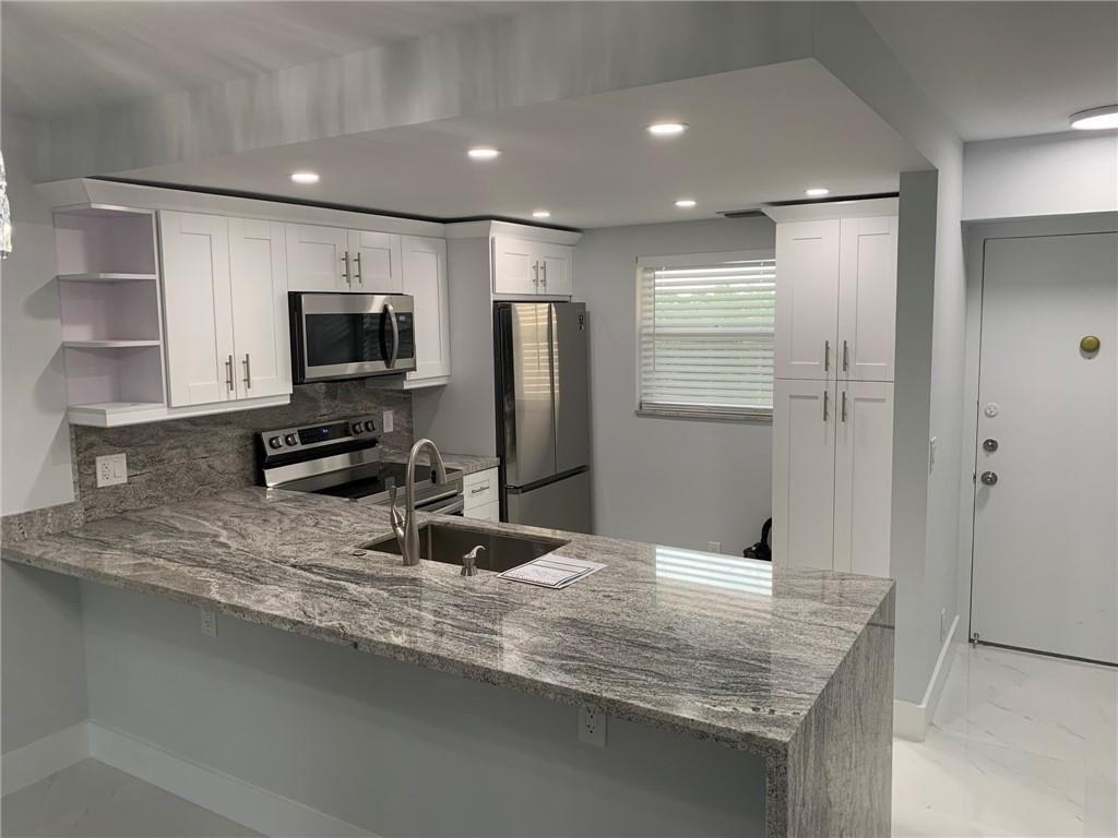 Photo of 314 SE 10th St #405, Dania Beach, FL 33004 (MLS # F10294491)