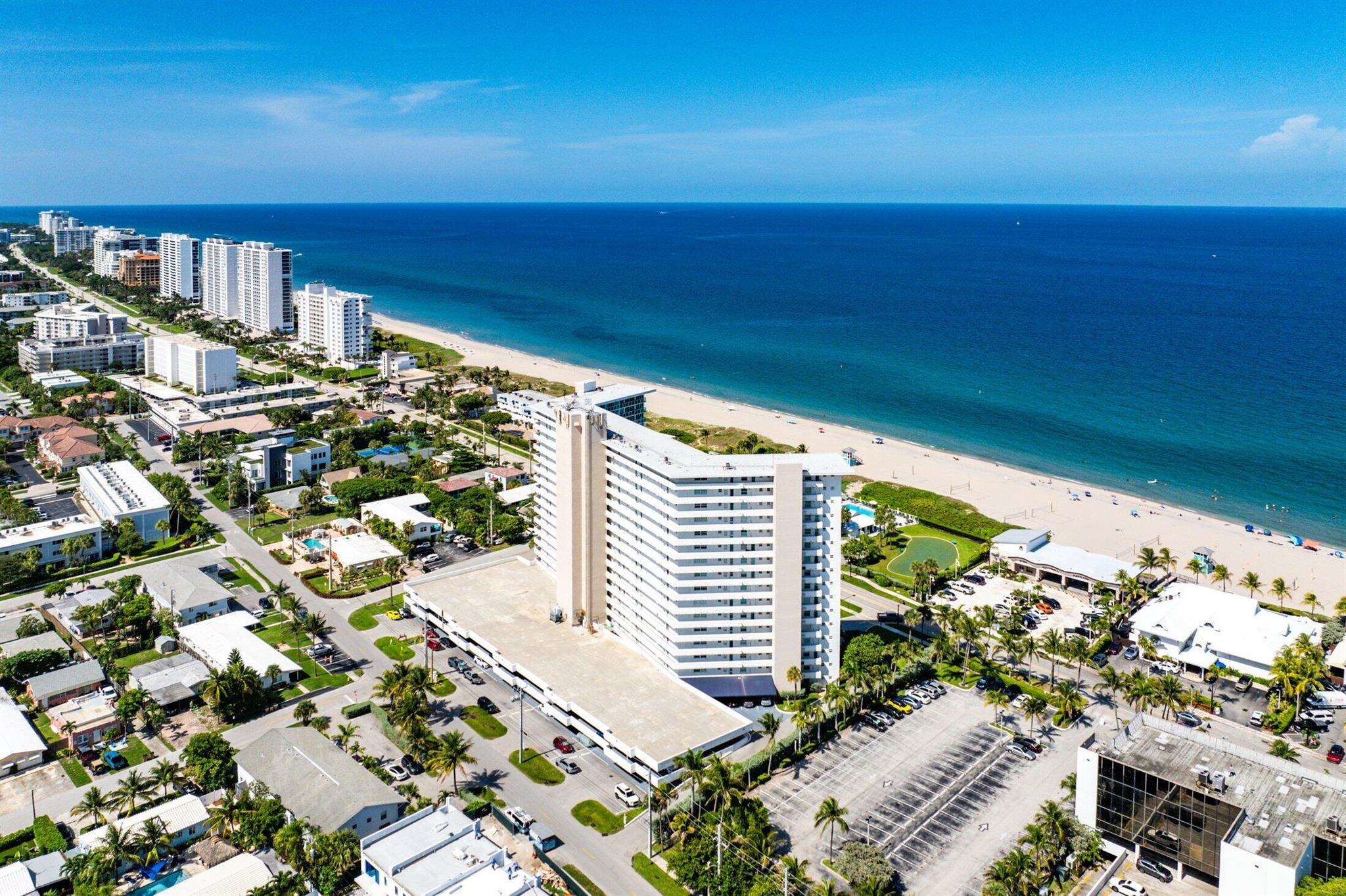 Discover your beachfront haven! This direct oceanfront condo provides breathtaking views at every turn. With 2 bedrooms and 2 bathrooms, the split floor plan is complemented by floor-to-ceiling hurricane impact windows. The kitchen is beautifully renovated, featuring quartz countertops and backsplash, as well as stainless steel appliances. The open layout creates a spacious living area, offering ocean views from every room. Gorgeous tile flooring extends throughout the space, and an expansive balcony invites you to enjoy your piece of paradise.Recent updates include a new AC unit (2023) and a tankless hot water heaterTake a short stroll across the street to JBs & Oceans 234. Celebrate at the newly renovated cabana and BBQ area. As an owner, you'll have access to all the Beach Club