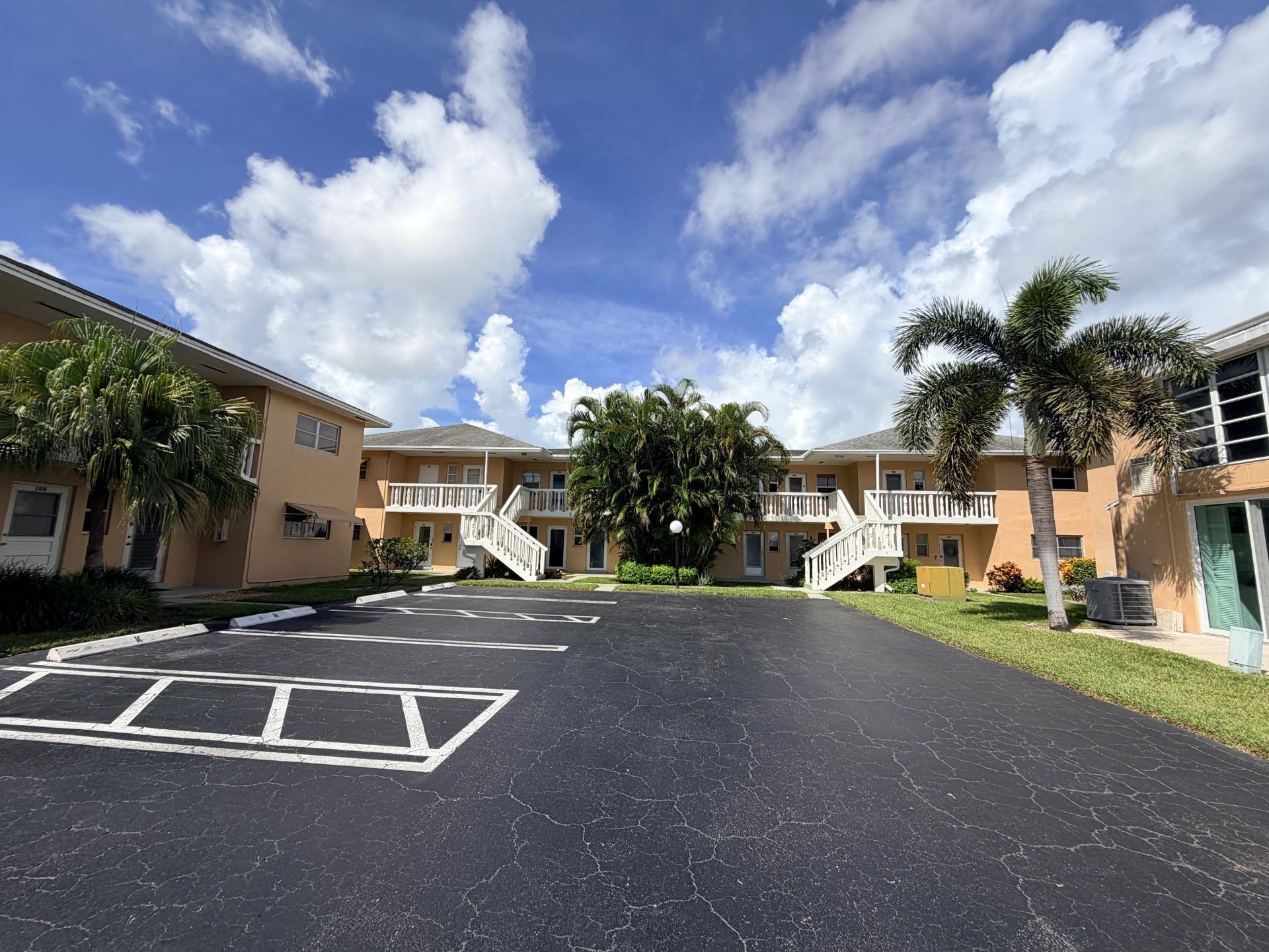Minimim 700 credit score required. Over 55 community. Person residing in unit must be 55+ no exceptions. No pets allowed as per condo association rules. Beautiful area east of I-95 and 8 miles to Palm Beach International Airport. Vacant, unfurnished, and ready to move into. Very spacious end unit with 2 large bedooms, updated kitchen with granite counters and stainless steel appliances, 2 partially updated bathrooms, enclosed sun porch, and full sized laundery in the unit.  Lots of closet space and 1 parking space included at door. Unit is on second level with stairs. Complex offers a pool, shuffleboard, BBQ area, and more. Walking distance to intercoastal waterway. Available immediately. Must be over 55 as per condo association rules. No pets. Minimum 700 credit score required.