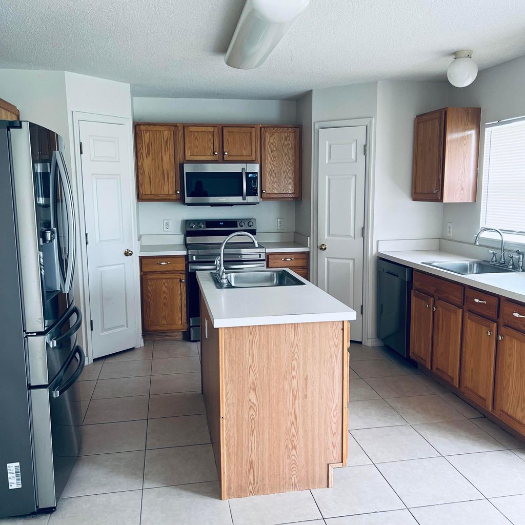 Photo of 6136 NW Gaylord Terrace, Port Saint Lucie, FL 34986 (MLS # B26028577)