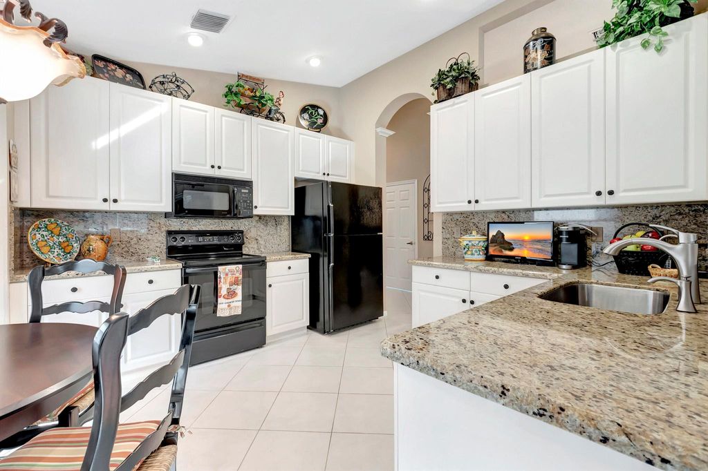 Photo of 6872 Lismore Avenue, Boynton Beach, FL 33437 (MLS # R10953309)