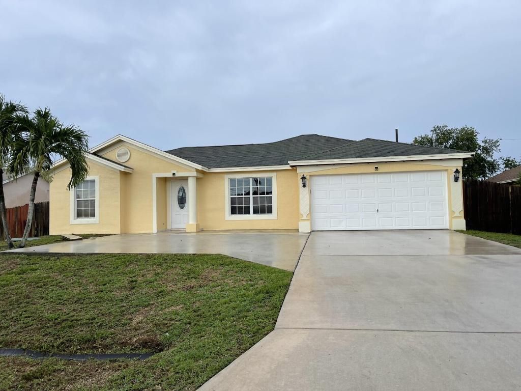 Photo of 3449 SW Ronald Street, Port Saint Lucie, FL 34953 (MLS # R10997216)