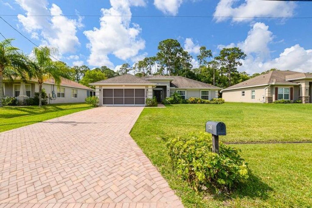 Photo of 1348 SW Wellington Avenue, Port St Lucie, FL 34953 (MLS # R10925965)