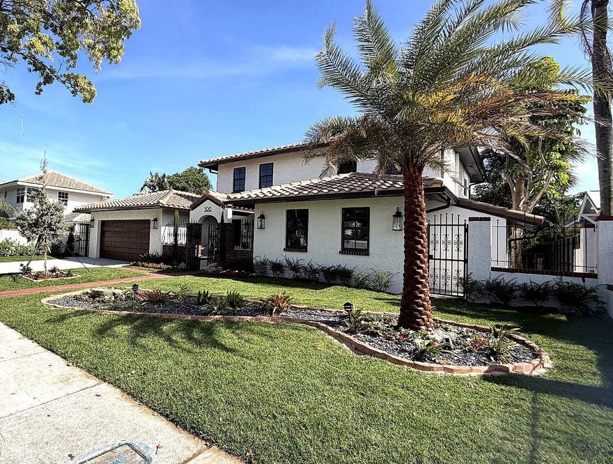 Welcome to this stunning 5-bedroom/ 4.5-bath residence located in the highly sought-after historic neighborhood of Southland Park. Thoughtfully reimagined from top to bottom, this home showcases a complete renovation including new roof, impact doors and windows, AC, plumbing, electrical, flooring, and finishes throughout. Designed to impress, the home seamlessly blends modern elegance with timeless vintage charm. Chef-inspired kitchen anchors an open-concept, perfect for entertaining, and complemented by a built-in wine cellar. Spa-like bathrooms have been beautifully renovated, and the home offers primary suites on both levels. Situated on an oversized lot, the expansive backyard is a true private oasis featuring a swimming pool and endless potential to create your dream outdoor space. Enjoy an unbeatable location just moments from the Intracoastal Waterway, scenic bike and jogging paths, waterfront parks with beach access, and pet-friendly green spaces. Ideally positioned near Downtown West Palm Beach, Palm Beach Island, Mira Lago, world-class dining, shopping, and cultural destinations including the Norton Museum of Art and Ann Norton Sculpture Gardens. With easy access to major highways, Brightline, Palm Beach International Airport, and the Palm Beach Zoo, convenience meets luxury at every turn.  Experience the best of South Florida living—no oceanfront required.