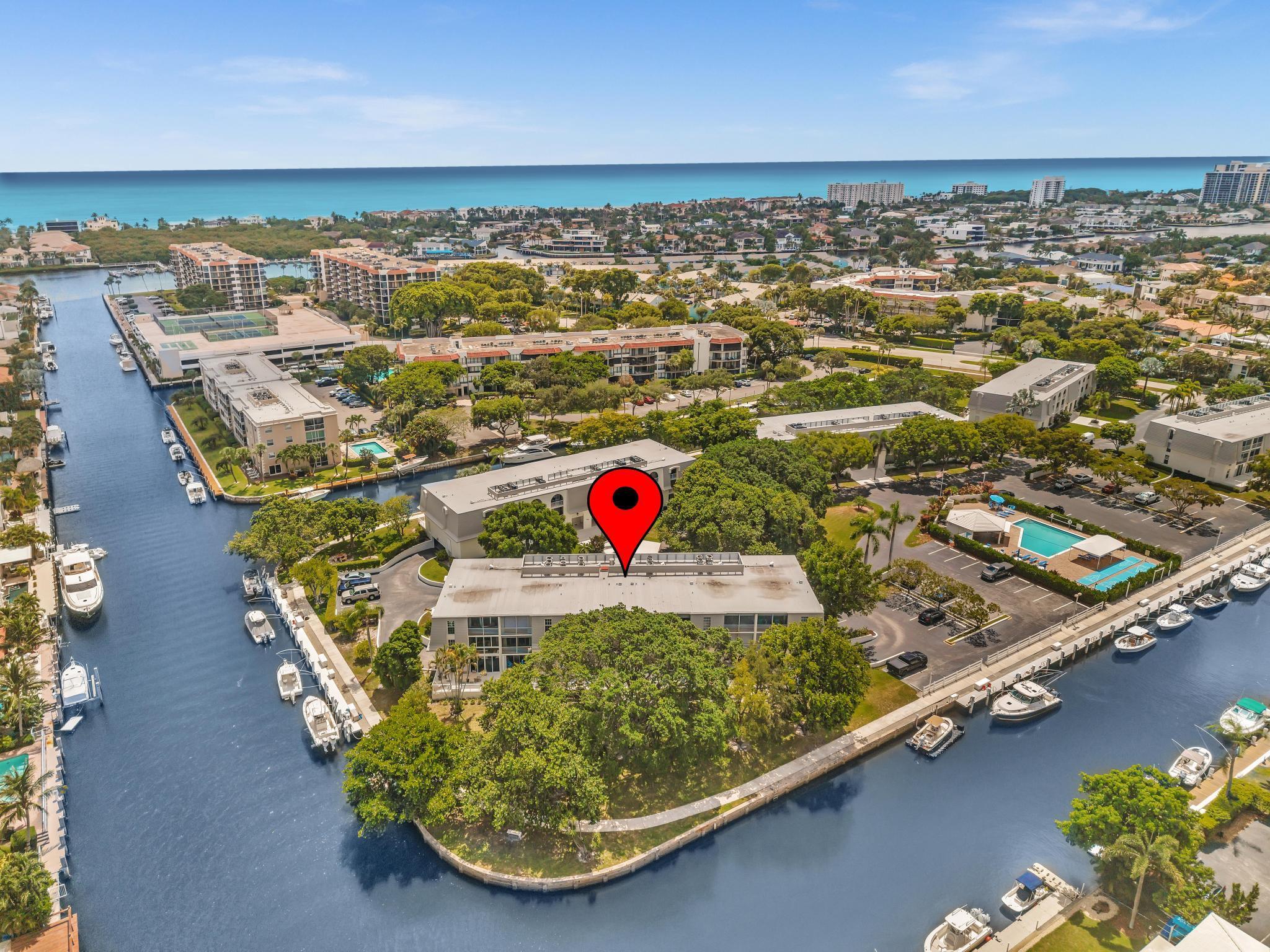 This beautiful East of US-1 unit features a water view with access to the Intracoastal and Ocean, no fixed bridges. Rare first floor exclusive unit walk out unit, with boat dockage available once you get on the list. Boasts awesome west view of canal, with mature tree's canopy in a very desirable neighborhood to call home. 2025 New A/C unit. French Village sits on seven acres and features a serene walking path were you can watch the boats go past or gaze at luxury homes. Equidistant to Ft Lauderdale and Palm Beach airports. Close to Boca Raton and Delray Beach downtown areas, for the best of both worlds. 1 bedroom and 1.5 baths. Tiled living areas, carpeted bedroom. Extra storage, garage parking with convenient elevator access. Just completely renovated pool.