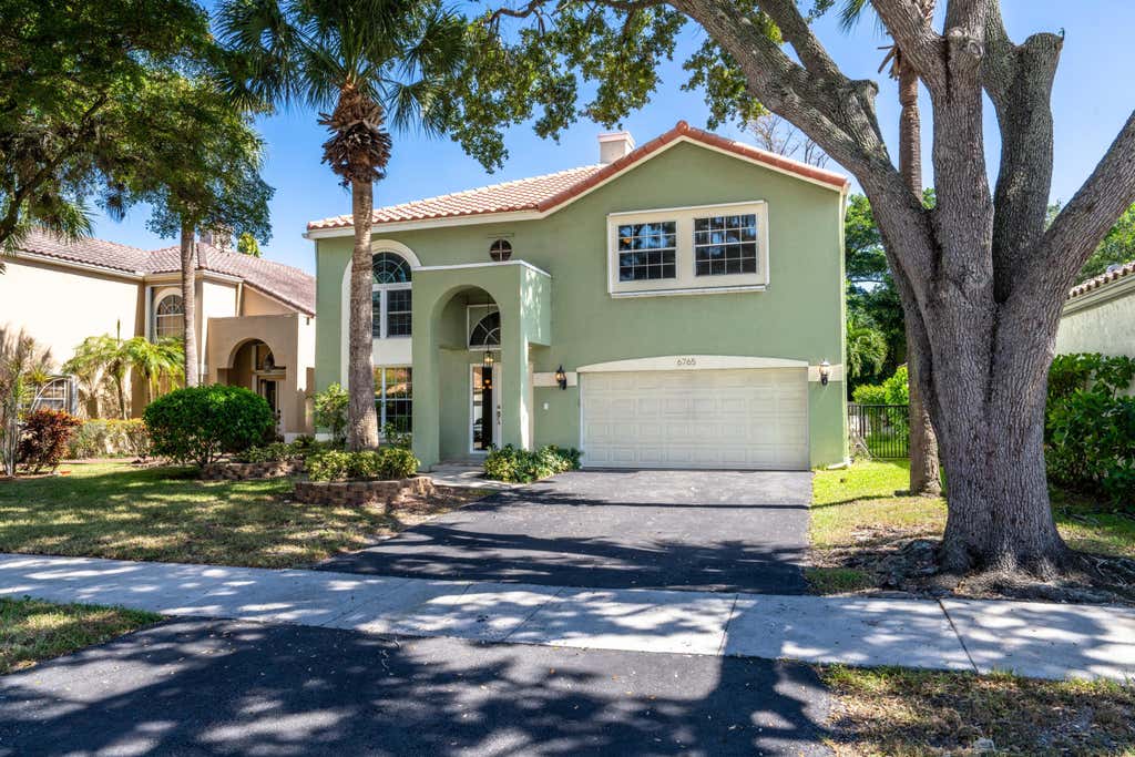 Photo of 6765 NW 75th Place, Parkland, FL 33067 (MLS # B26066219)