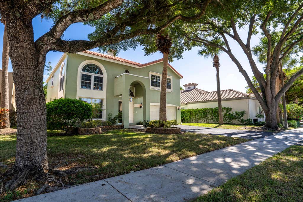 Photo of 6765 NW 75th Place, Parkland, FL 33067 (MLS # B26066219)