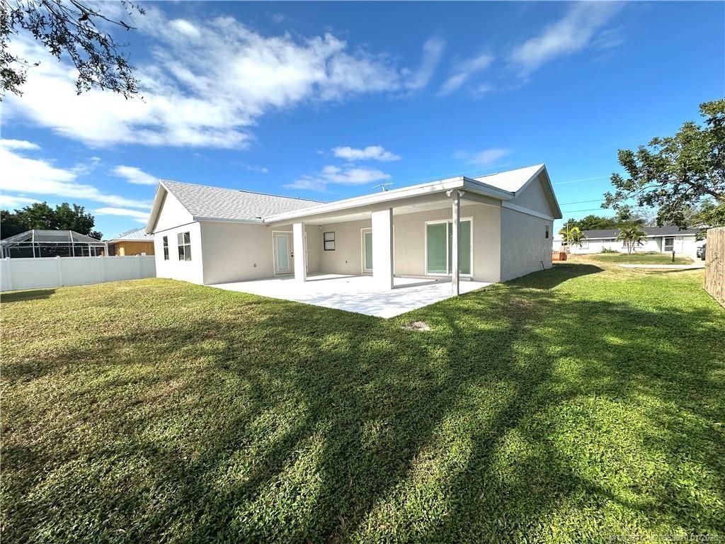 Photo of 608 SE Dean Terrace, Port Saint Lucie, FL 34984 (MLS # R11159413)