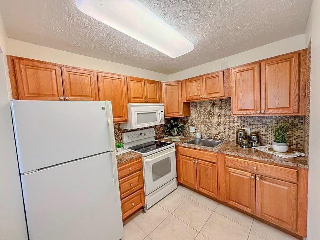 Photo of 54 Newport Court #c, Deerfield Beach, FL 33442 (MLS # B26061122)
