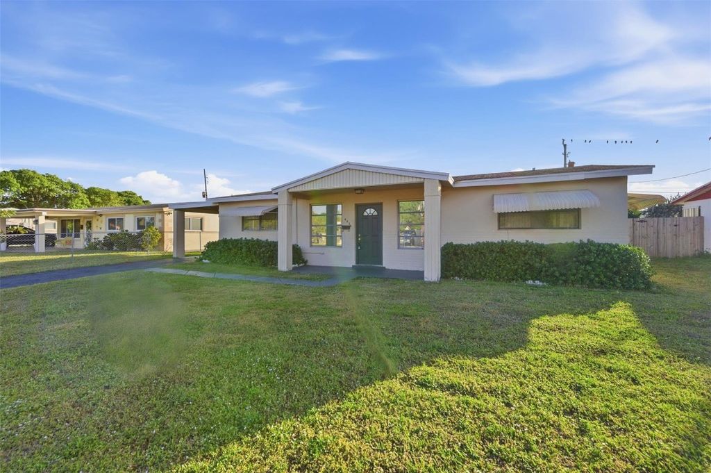 Photo of 4030 NW 3rd Way, Deerfield Beach, FL 33064 (MLS # F10549158)