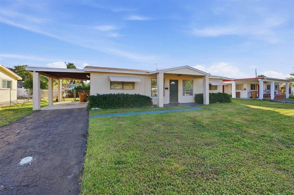 Photo of 4030 NW 3rd Way, Deerfield Beach, FL 33064 (MLS # F10549158)