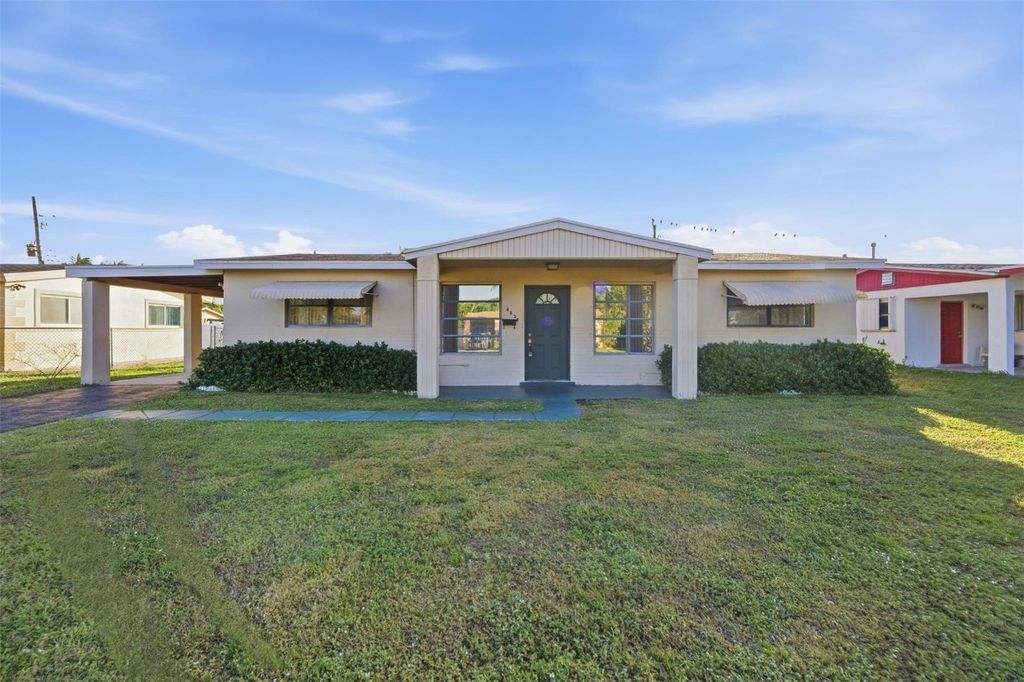 Photo of 4030 NW 3rd Way, Deerfield Beach, FL 33064 (MLS # F10549158)