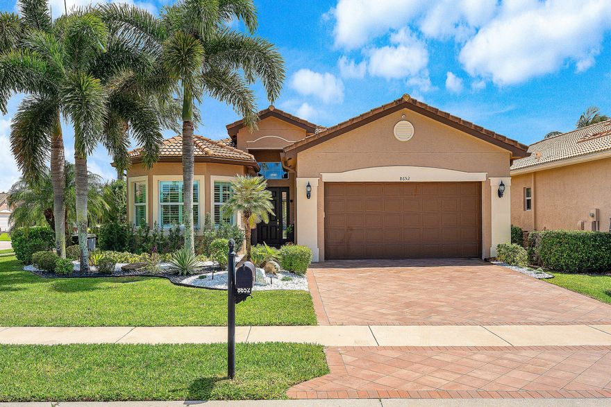 This lushly landscaped Bimini model sits on an oversized corner lot backing south. The home (3BR+den/3BA) has impact windows, whole house generator, hurricane screens, newer A/C, 24" porcelain tile, crown moldings, designer window treatments & light fixtures, fans, LED hi-hats, custom built-ins, upgraded baths & more! The gourmet kitchen features dark wood cabinetry, quartz countertops with full height backsplash, split oven, built-in pantry cabinet, extended snack bar, separate breakfast area and much more!  Great room and dining room are open to the kitchen. The primary suite has two outfitted walk-in closets and a luxurious bath. The den/optional bedroom has pocket doors and a built-in unit with desk area. You'll love the private backyard w/extended wraparound patio and birdcage screen. Valencia Cove is a premier 55+ lifestyle community featuring a spectacular 39,000 square-foot clubhouse and 10 acre outdoor recreational facility. Endless activities and opportunities for fun abound - there are activities, trips, shows, and clubs of all types. The clubhouse features an expansive foyer and lobby, grand ballroom with raised stage and dance floor, four spacious card rooms, Cafe with indoor/outdoor seating, Arts and crafts room with kiln, Internet/Billiards room, Office, Catering kitchen with separate demonstration cooking studio, Yoga & exercise studio with ping pong, fully equipped fitness center and men's and women's locker rooms with steam rooms, massage room and showers. There are four pools - a beautiful Resort-style pool and Shade Pavilions, Lap pool with Swimmers' Lap Lanes, Resistance walking pool, Grandchildren's wading pool, and an Outdoor whirlpool spa. There are eight har-tru tennis courts with shade pavilions and lighting for night play, tennis pro shop, tennis pro, league play, six pickleball courts, pickleball pro, league play, 2 bocce courts, league play, half-court basketball and walking/jogging/biking paths throughout and just outside the community. Valencia Cove is conveniently located near shopping, restaurants, houses of worship and major highways!