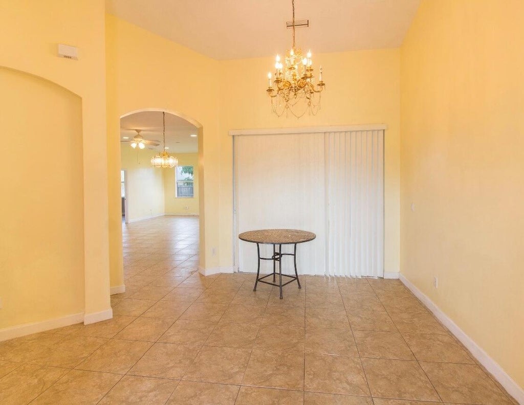 Photo of 787 SE Evergreen Terrace, Port Saint Lucie, FL 34983 (MLS # B26060119)