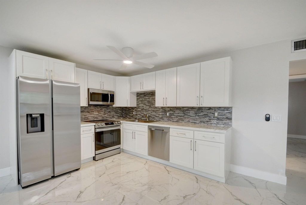 Photo of 63 Waterford C, Delray Beach, FL 33446 (MLS # R10948145)