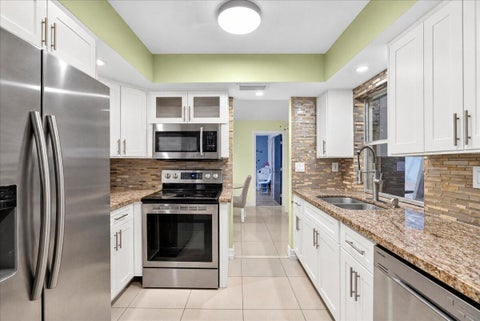 Tiny photo for 4911 NW 14TH Ter, Deerfield Beach, FL 33064 (MLS # B26079335)