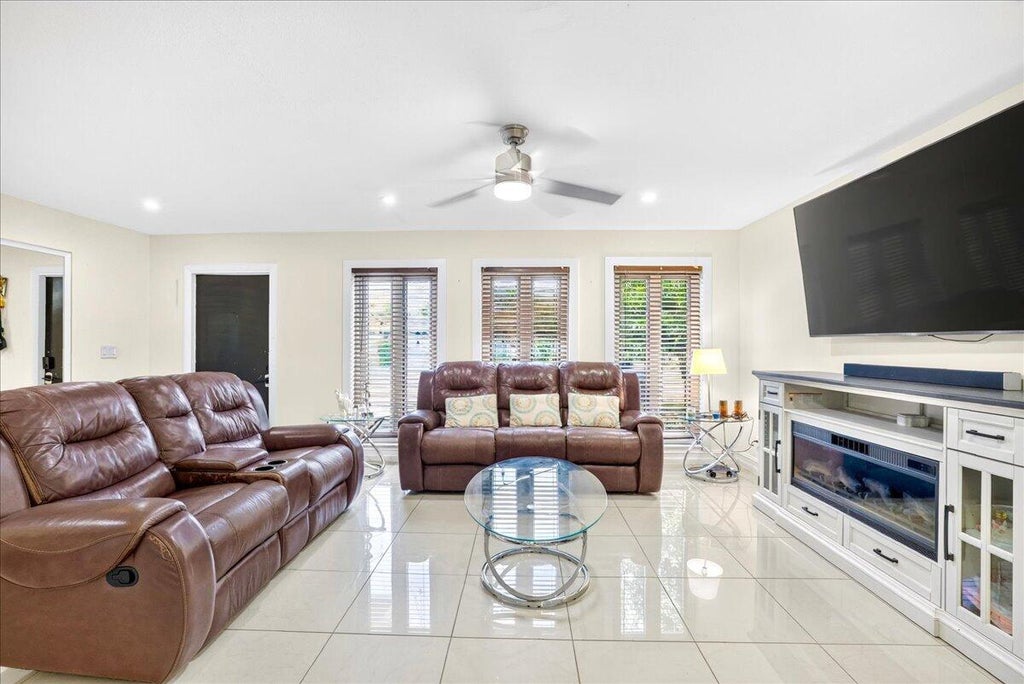 Photo of 4911 NW 14TH Ter, Deerfield Beach, FL 33064 (MLS # B26079335)