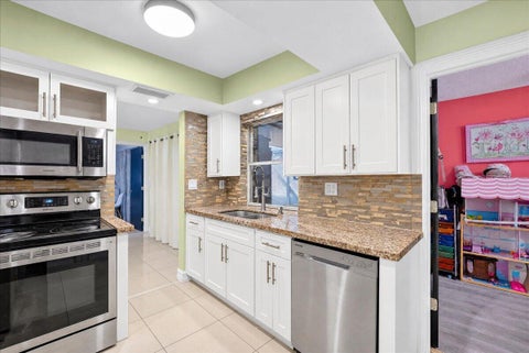 Tiny photo for 4911 NW 14TH Ter, Deerfield Beach, FL 33064 (MLS # B26079335)