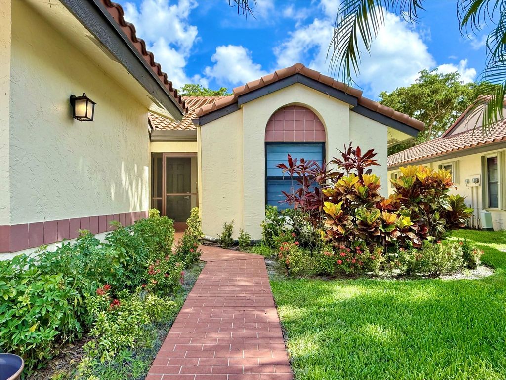 Photo of 5908 Sunswept Ln #B, Boynton Beach, FL 33437 (MLS # F10543116)