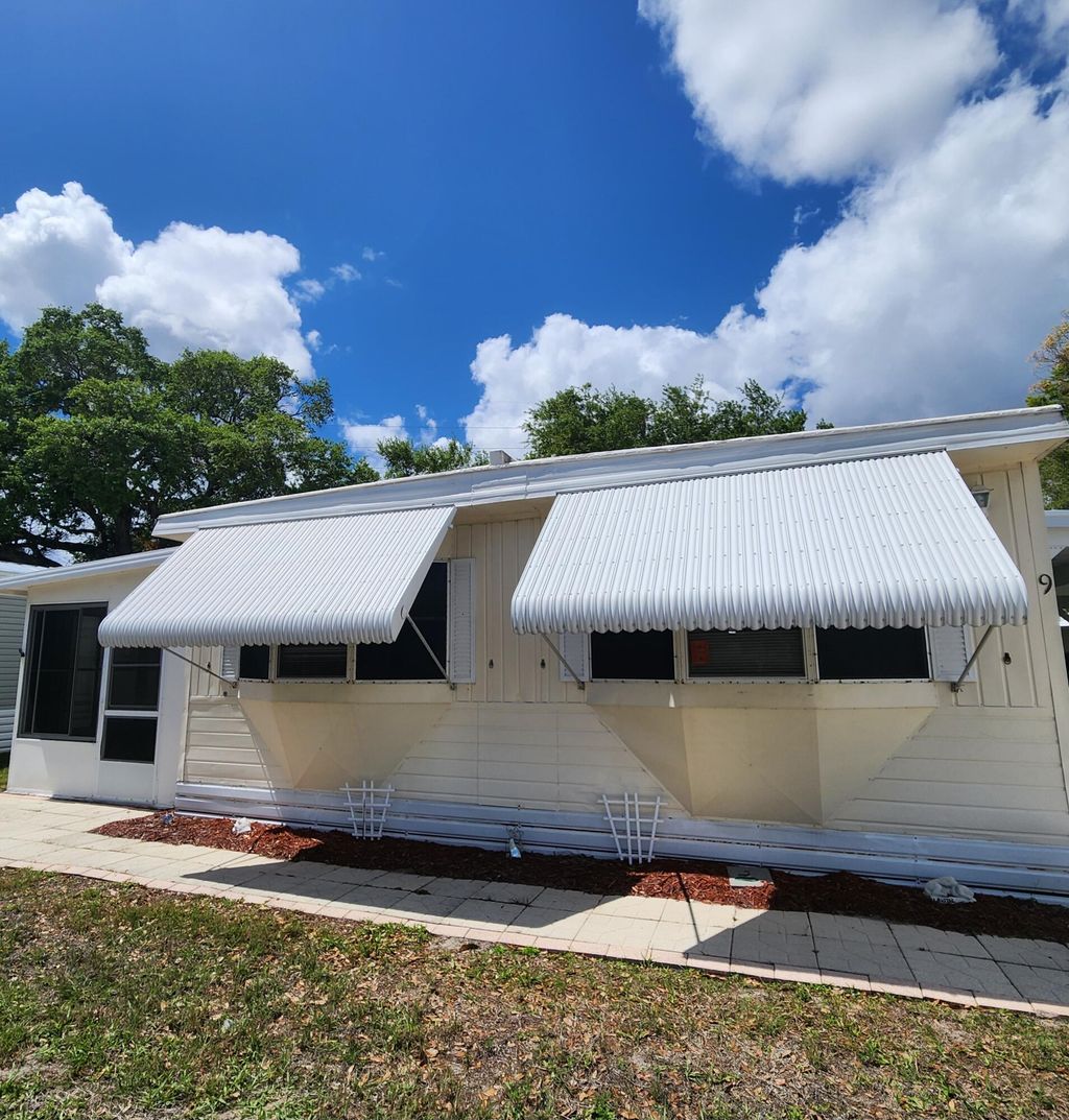 Photo of 9 Margarita Lane, Port Saint Lucie, FL 34952 (MLS # B26005198)