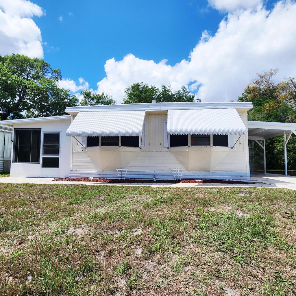 Photo of 9 Margarita Lane, Port Saint Lucie, FL 34952 (MLS # B26005198)