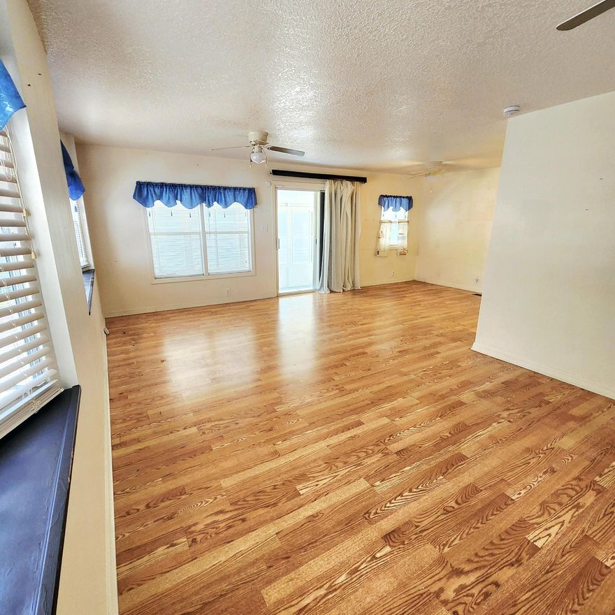 Welcome to this charming 2 bed/2 bath on a cul-de-sac w/ a Large, Well Lit, Enclosed Florida Room that serves as extra room/den/office & more! Beautiful flooring, brightly lit home, affordably Priced to Sell! Master bedroom boasts en-suite bathroom. Step outside & it gets better - find a Large Shed & Outdoor Closet for ample Storage! Lot offers tropical vibes, lots of greenery & private small yard area for Gardening, Pets & More! Storm Shutters Available. PRIME LOCATION; close to the beach, the mall, grocery stores, diners, coffee shops, post office, banks, pharmacy, hospitals & more. Lot Lease 842.53 includes lawn care, trash, Private Free Golf Course,Heated Pool,Pickleball, Tennis, Shuffleboard, Bocce,Gym,Library, cards, Mahjong, Bible study, Workshop, Dinners, Parades, Dances & more!