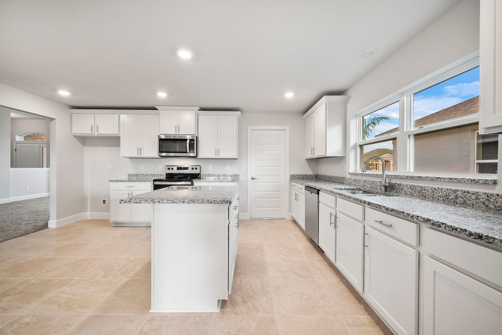 Photo of 8753 Waterstone Boulevard, Fort Pierce, FL 34951 (MLS # R10970506)