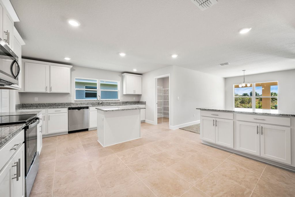 Photo of 8753 Waterstone Boulevard, Fort Pierce, FL 34951 (MLS # R10970506)