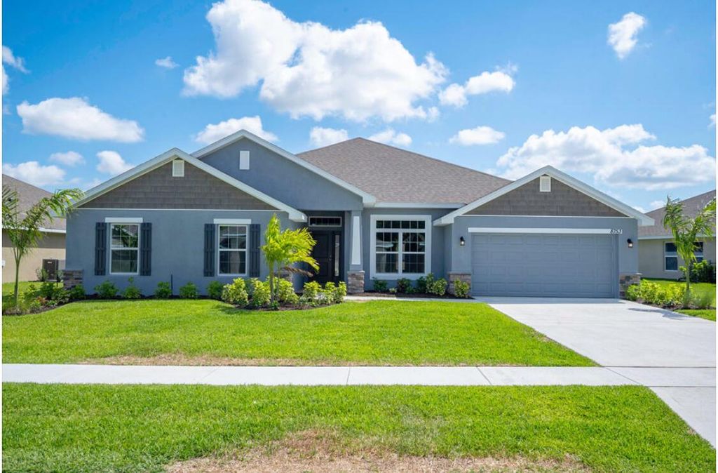 Photo of 8753 Waterstone Boulevard, Fort Pierce, FL 34951 (MLS # R10970506)