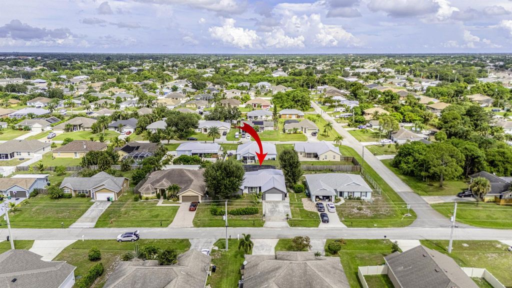 Photo of 3989 SW Jarmer Road, Port Saint Lucie, FL 34953 (MLS # R11127312)