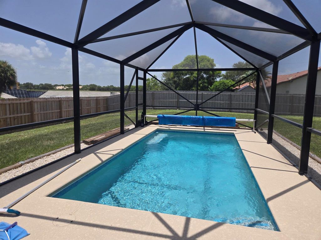 Photo of 2702 SE South Blackwell Drive, Port Saint Lucie, FL 34952 (MLS # R11110691)