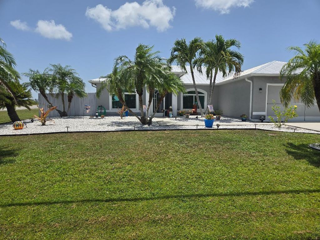 Photo of 2702 SE South Blackwell Drive, Port Saint Lucie, FL 34952 (MLS # R11110691)